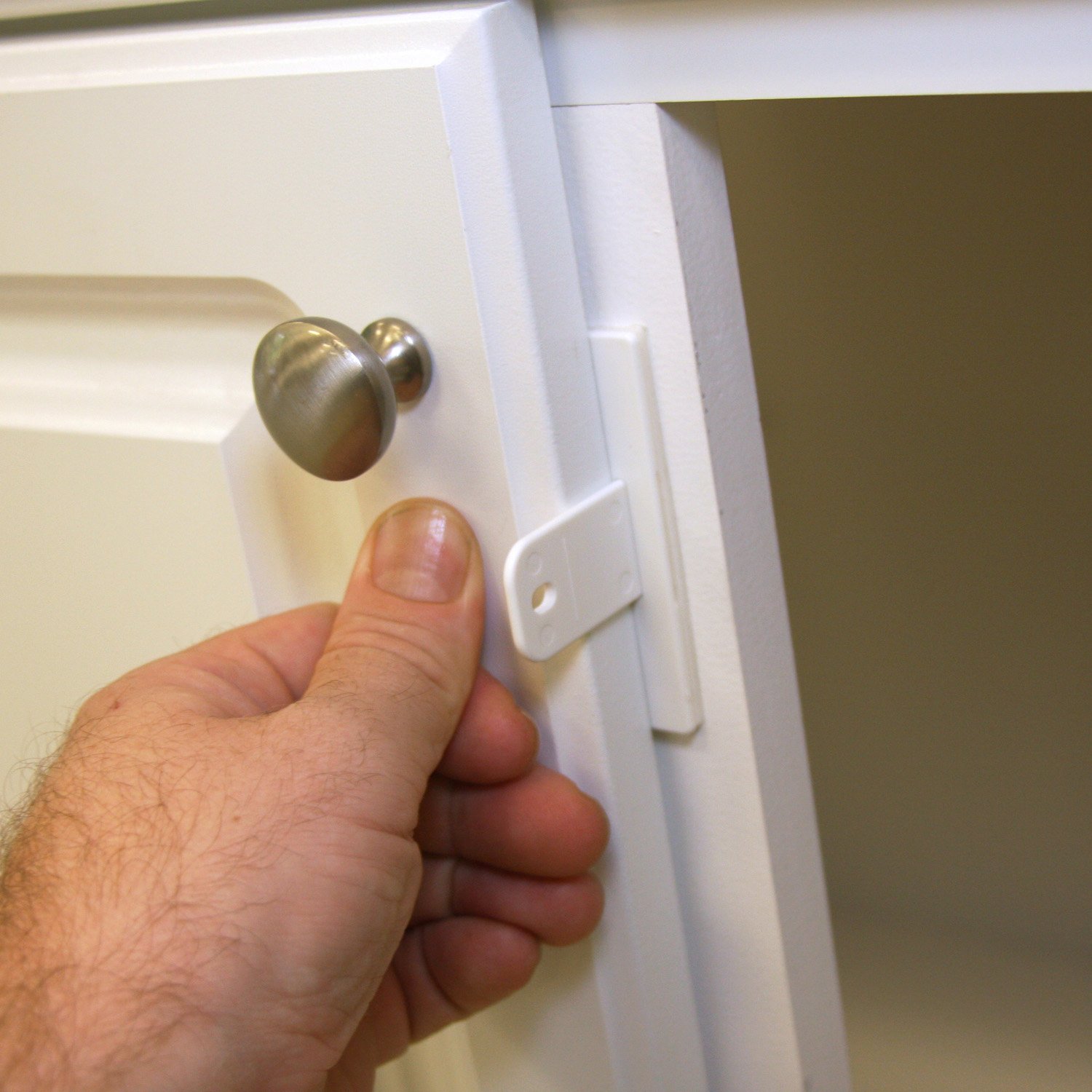 Qdos Safety Adhesive Double Door Cabinet Lock | White | Easy One Handed Operation - Patented ZeroPinch Design - Only Fits Standard Framed Cabinets and Furniture - Baby Proofing Doesn't Have to be Ugly - Image 6